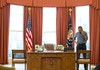 President Barack Obama talks on the phone in the Oval Office with Russian President Vladimir Putin about the situation in Ukraine, March 1, 2014.
